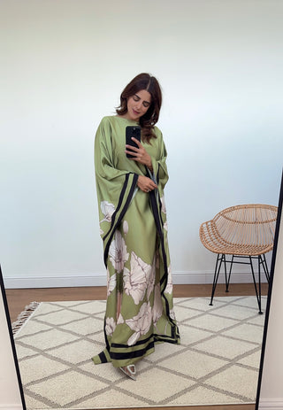 Elegant pistachio green floral kaftan dress with belt, perfect for Eid fashion.